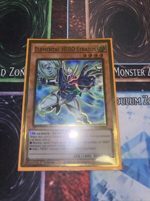 Yugioh  - Elemental HERO Stratos - 1st Ed - MAGO-EN004 - Alt Art Gold Rare-image