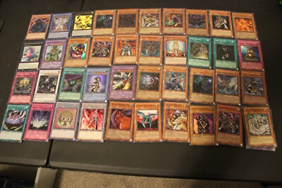 50 EX-DMG Foil Yugioh Card Lot(Destiny Hero - Dogma POTD, Kuriboh MRD+)-image
