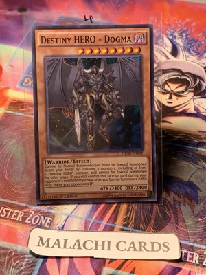 Yugioh x1 Destiny Hero - Dogma (Super Rare 1st Ed DESO-EN011) (Light Play!)-image
