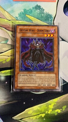 YuGiOh Destiny Hero - Doom Lord EOJ-EN001 Unlimited Edition Common TCG Card LP-image